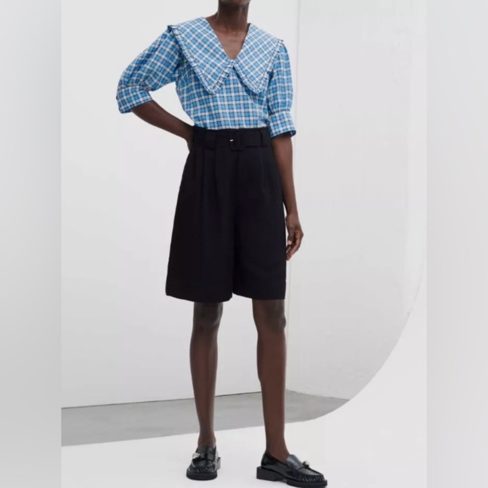 Black loose-fitting shorts from Ganni. Size 34